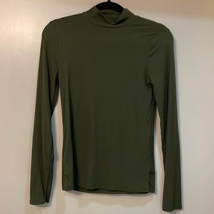Green turtle neck